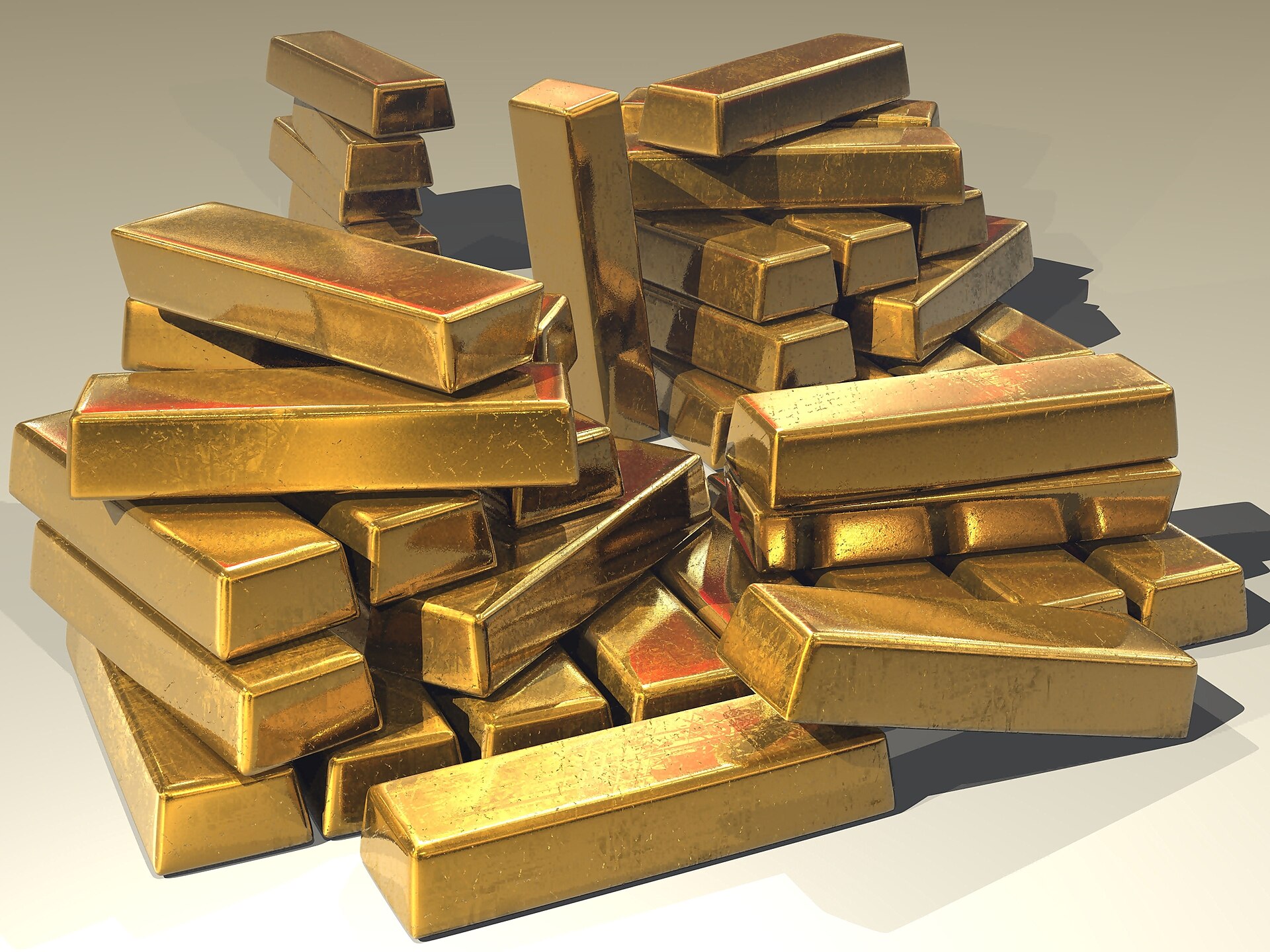 금값 트렌드와 관련된 A pile of stacked gold bars